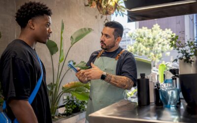 Client and barber discussing haircut style