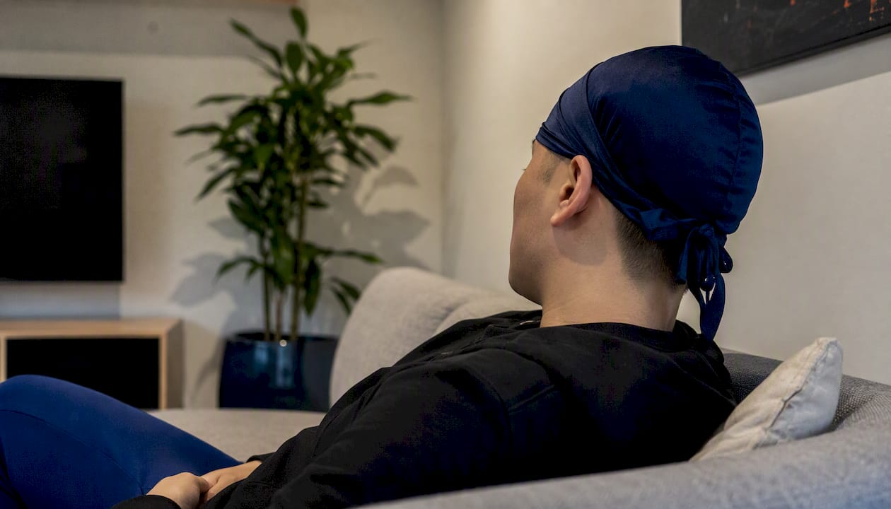 Man wearing durag to protect haircut at night