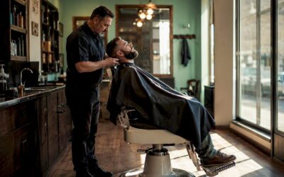 Barber trimming a man's beard